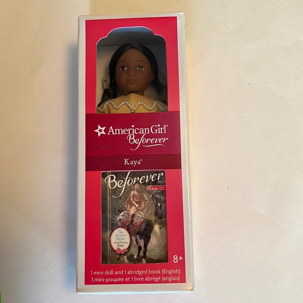 NIB- mint condition American girl Kaya mini doll and book